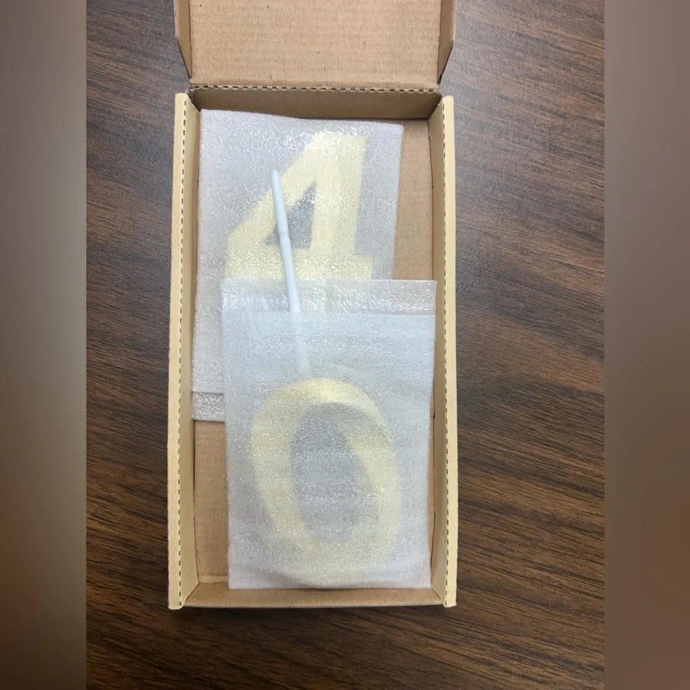 Gold “40” birthday candles. 2 pieces.
